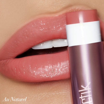 Smooth, glossy lips with Girlactik Jello Gloss Balm in shade Au Naturel, showcasing hydration and shine.