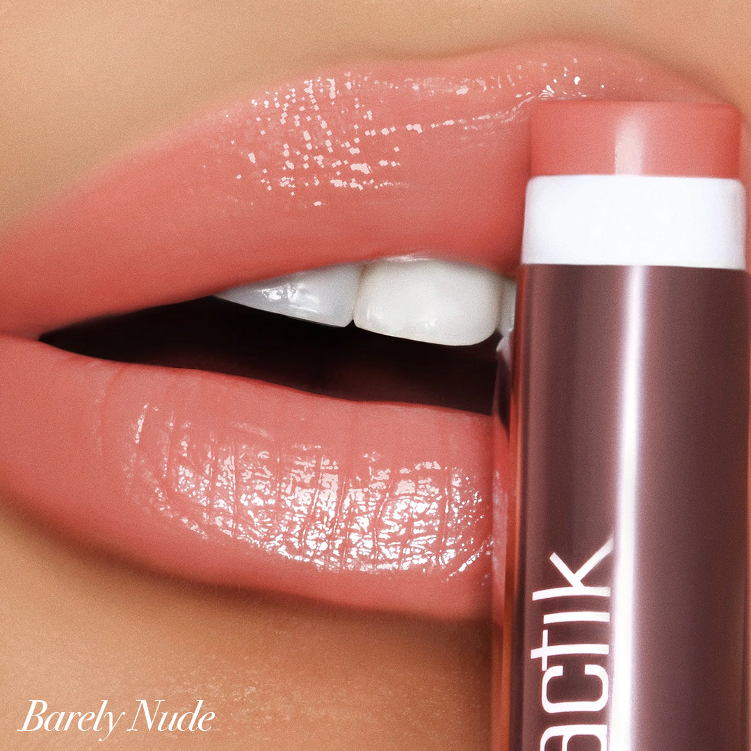 Girlactik Jello Gloss Balm in Barely Nude, showcasing glossy, hydrated lips with a dreamy application and pink lemonade scent.