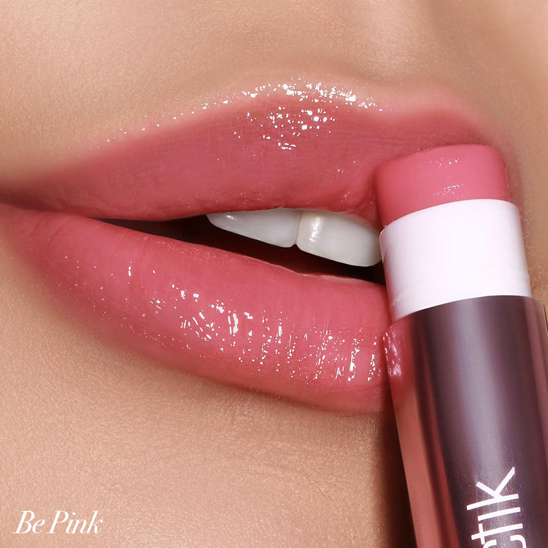 Close-up of lips applying Girlactik Jello Gloss Balm in Be Pink, showcasing its glossy, non-sticky finish and nourishment.