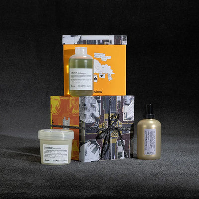 Davines Momo More Inside Gift Set featuring shampoo, conditioner, and blow dry primer for hydrated, healthy hair.