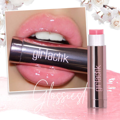 Girlactik Jello Gloss Balm with smooth application on hydrated lips, showcasing glossy pink finish and sleek packaging.