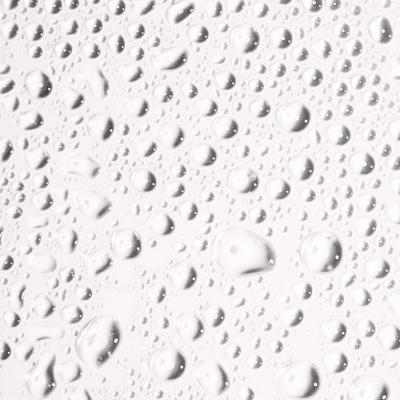 Close-up of clear water droplets on a smooth surface, highlighting freshness and hydration.