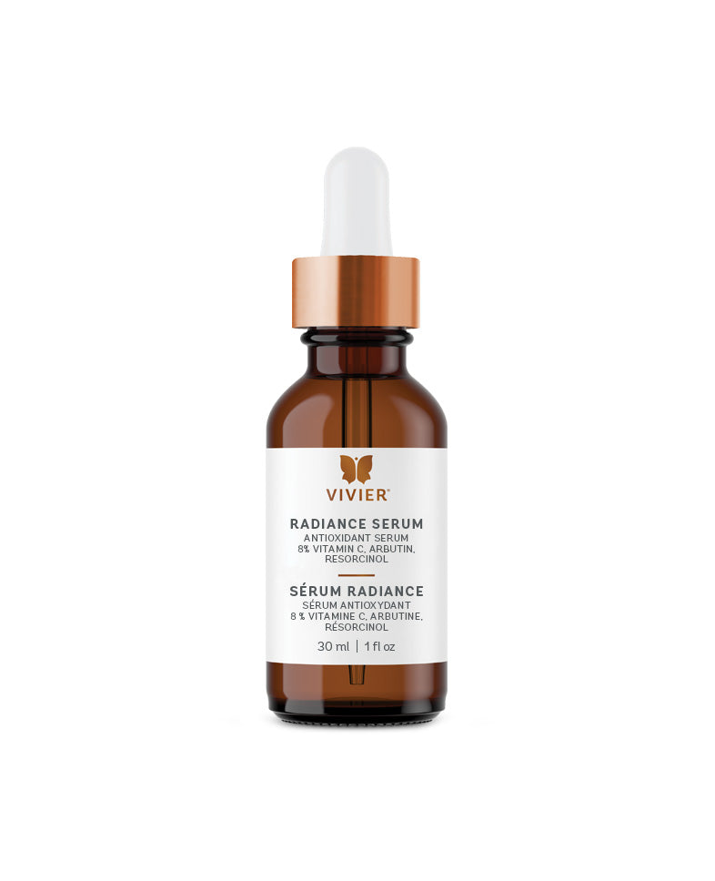 Vivier Radiance Serum in a brown glass bottle with dropper, designed to brighten skin and reduce signs of aging.