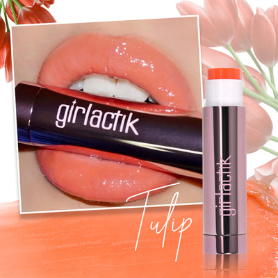 Girlactik Jello Gloss Balm in Tulip applied on lips, showcasing a glossy, non-sticky finish and pink lemonade scent.