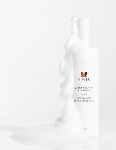 Vivier Ultra Foaming Cleanser bottle with foamy texture, ideal for deep cleansing and hydration for all skin types.