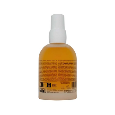 Silk Oil Blend Conditioning Oil bottle with a pump, designed to tame frizz and enhance shine for unruly hair.