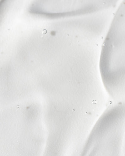 Close-up of smooth, lightweight hydrating gel with droplets, showcasing the texture of Vivier Ultimage™.