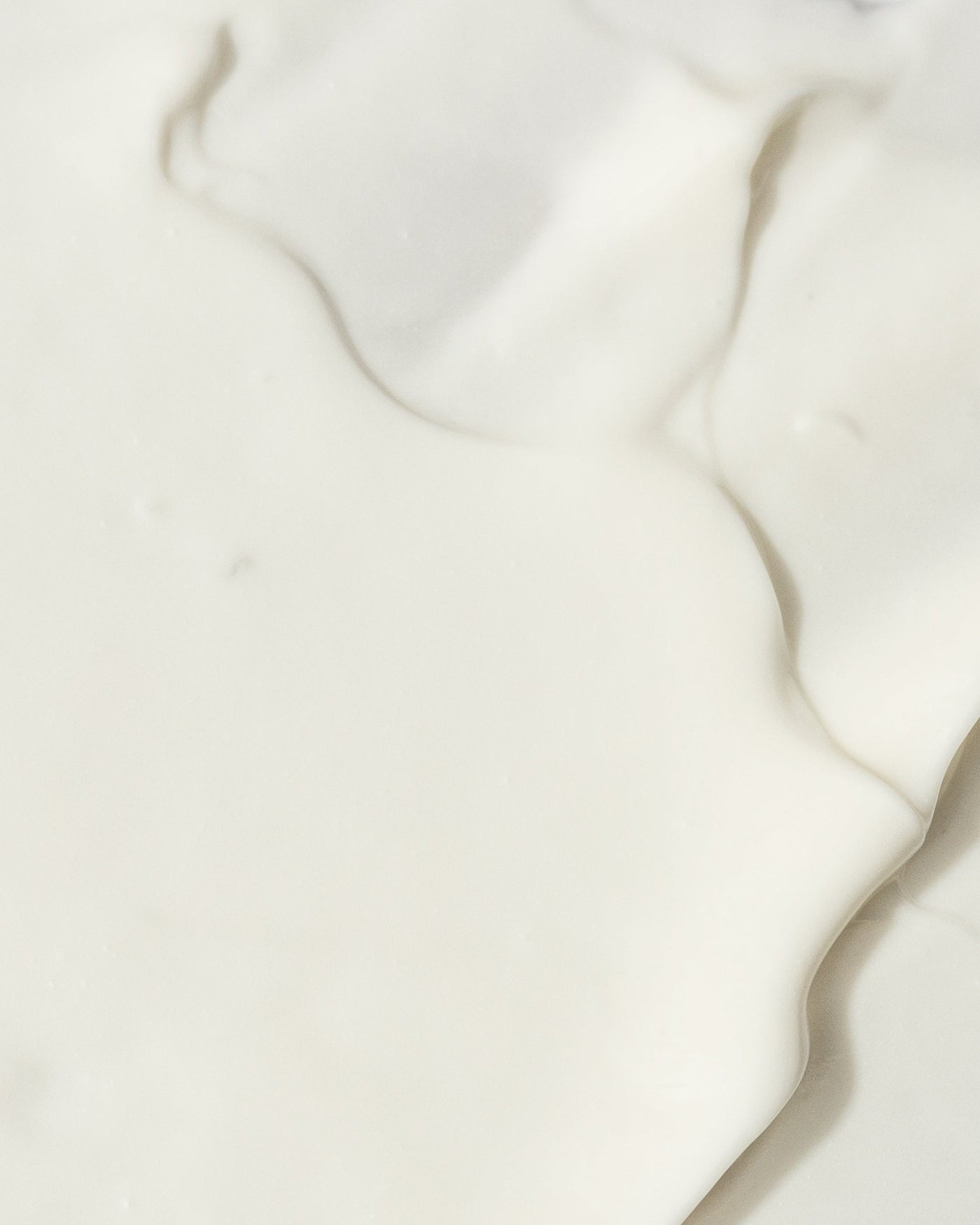 Close-up of creamy texture from Vivier Ultra Hydrating Mask, showcasing its rich and nourishing consistency.