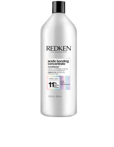 Redken Acidic Bonding Concentrate Conditioner 1L for strengthening and repairing damaged hair, suitable for all hair types.