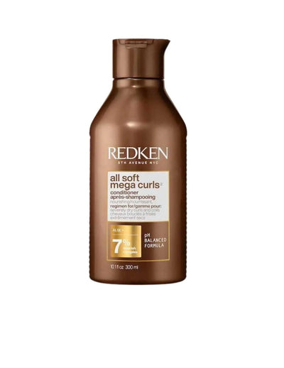 Redken All Soft Mega Curls Conditioner bottle designed for hydrating and defining curly hair.