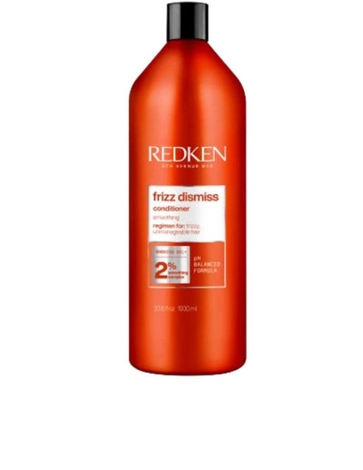 Redken Frizz Dismiss Conditioner 1L bottle designed to control frizz and leave hair smooth, suitable for all hair types.