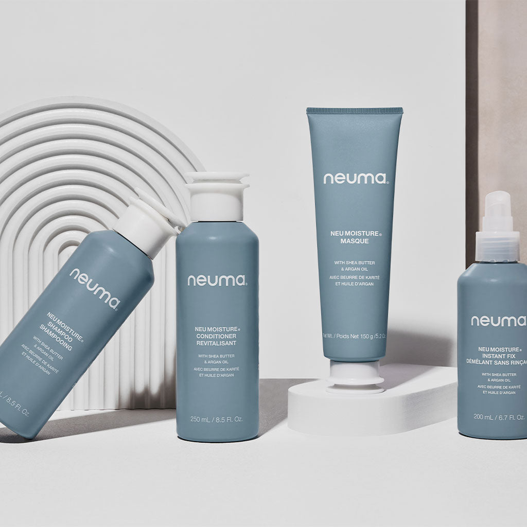 Neuma Moisture Masque set featuring hydrating hair treatment and conditioner in elegant packaging, ideal for moisture replenishment.