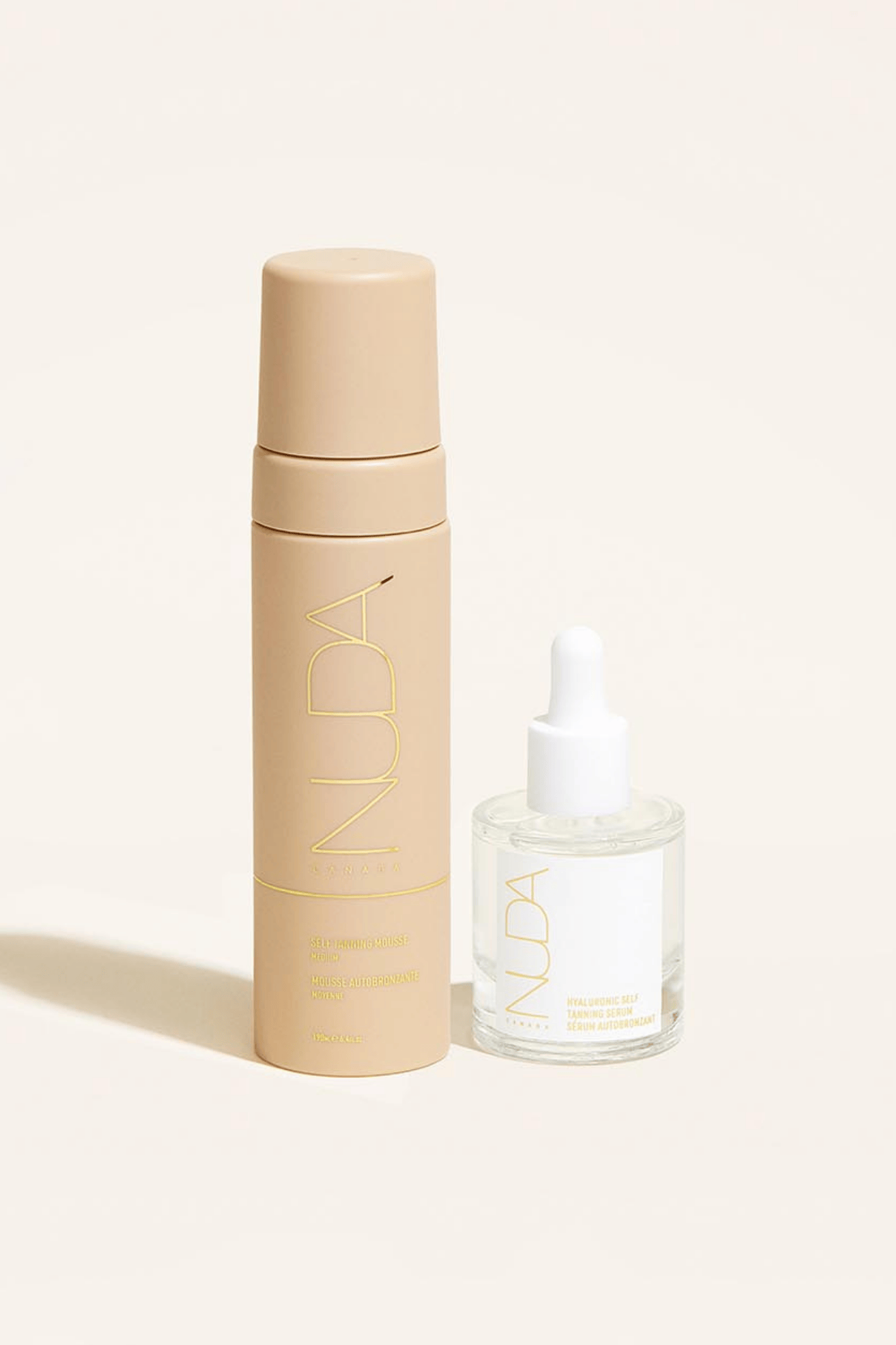 Nuda Glow Duo featuring Self Tanning Mousse and facial self tanner for a customized, radiant tan year-round.