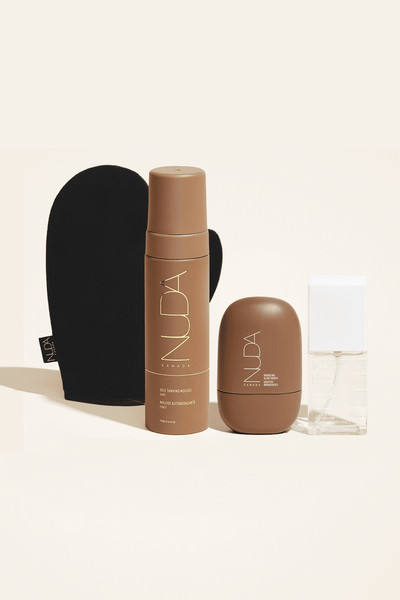 Ultimate Glow Kit featuring self tanning mousse, facial tanner, and tanning mitt for a flawless, bronzed glow.