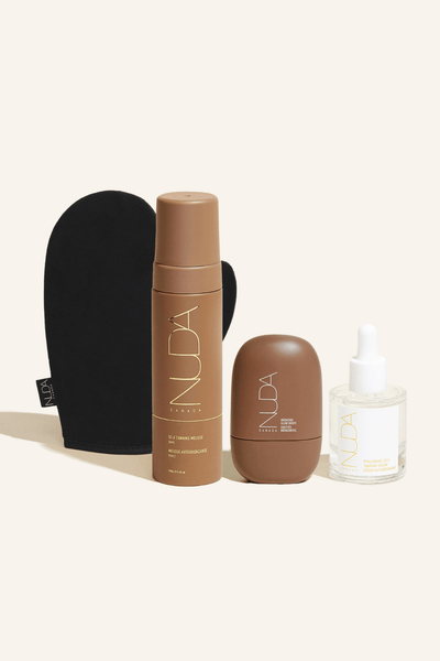 Ultimate Glow Kit featuring self tanning mousse, mitt, and bronzing drops for a customizable glow.