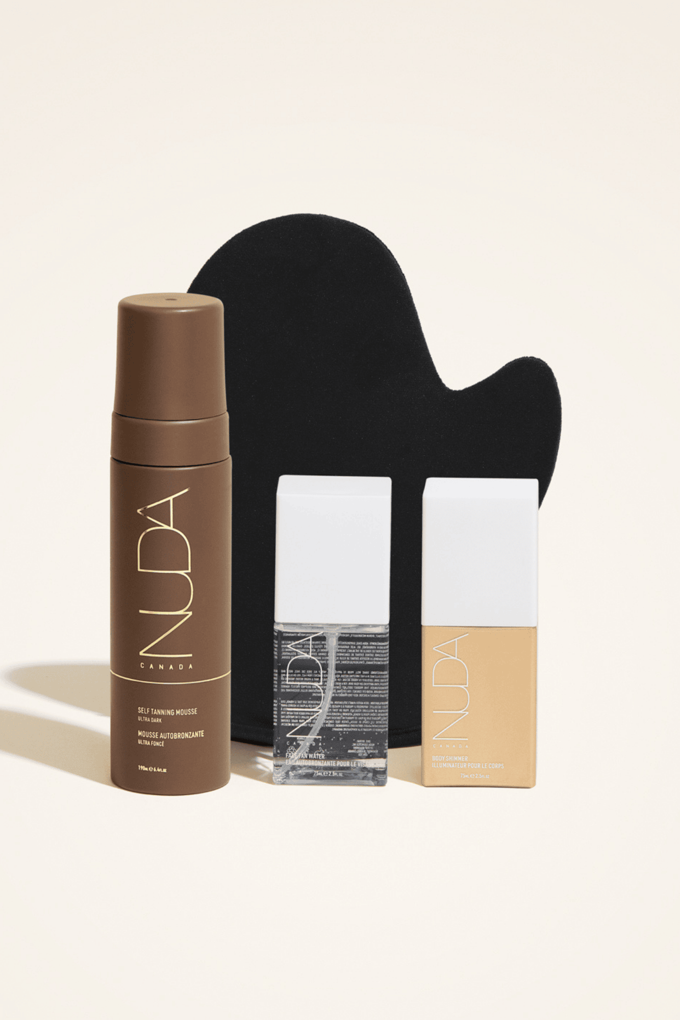 Ultimate Glow Kit featuring self tanning mousse, facial tanner, and tanning mitt for a flawless bronzed look.