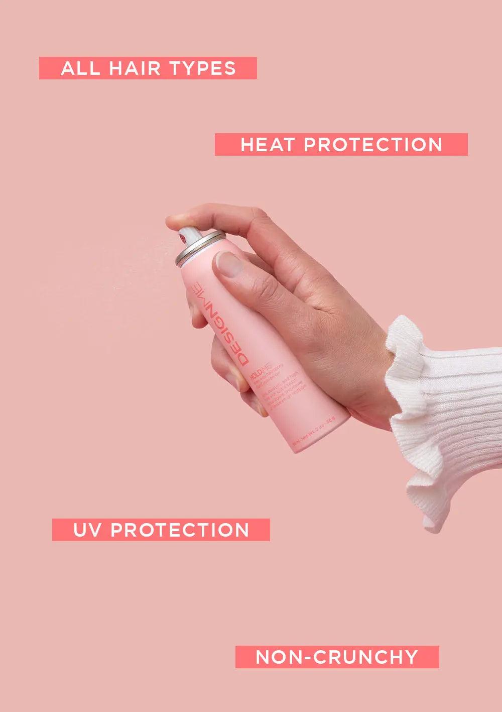 Hand holding DESIGNME spray for all hair types, providing heat and UV protection without a crunchy finish.