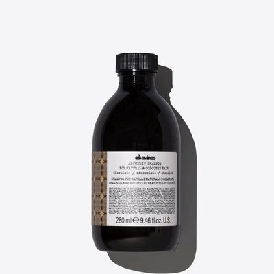 Davines Alchemic Shampoo for natural and colored hair 280 ml bottle on a white background