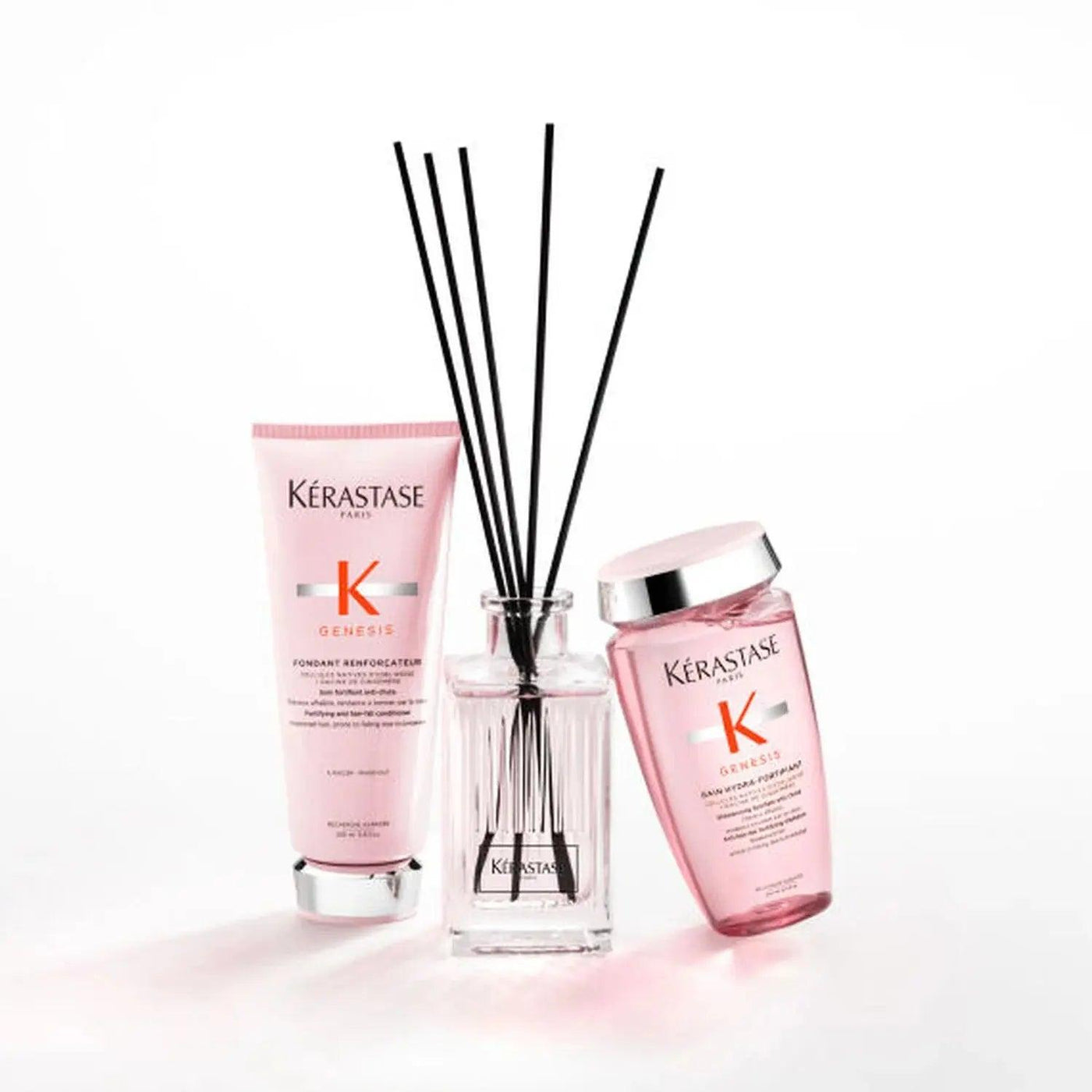 Kérastase Genesis home fragrance collection featuring diffuser, shampoo, and conditioner in stylish packaging.