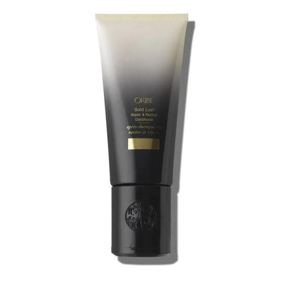 Oribe Gold Lust Repair & Restore Conditioner tube for hair treatment and nourishment.