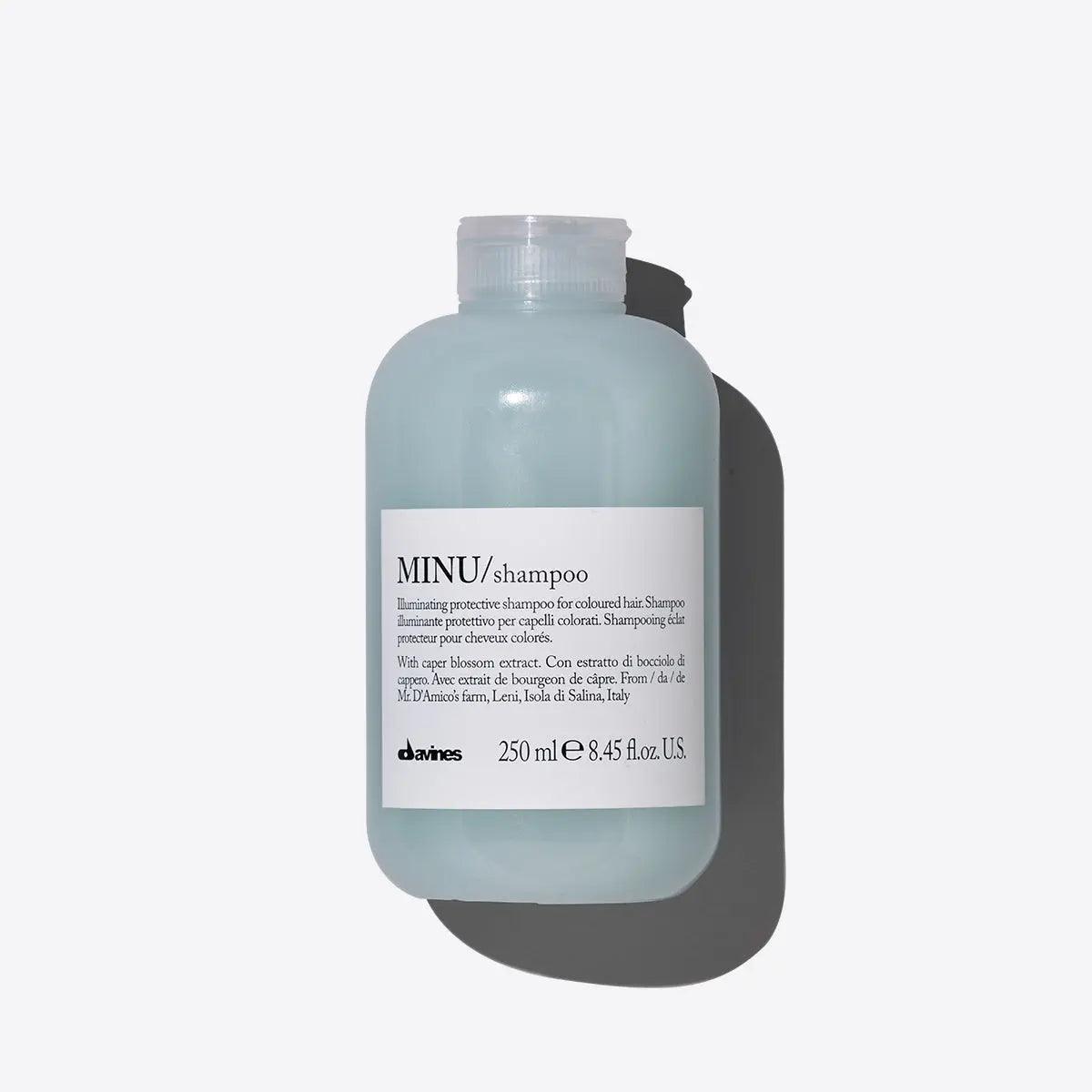 Davines Minu Shampoo 250ml bottle for color-treated hair, providing illuminating and protective benefits with caper blossom extract.