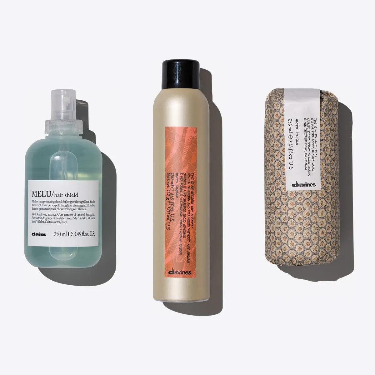 Davines MELU hair shield, volume spray, and treatment bar on a clean background for hair care essentials.