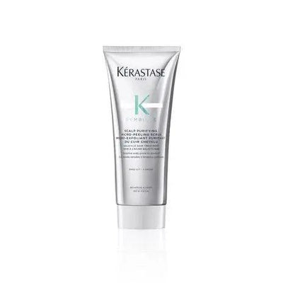 Kerastase Scalp Purifying Micro-Peeling Scrub in a silver tube, suitable for all hair types and textures, promotes scalp health.